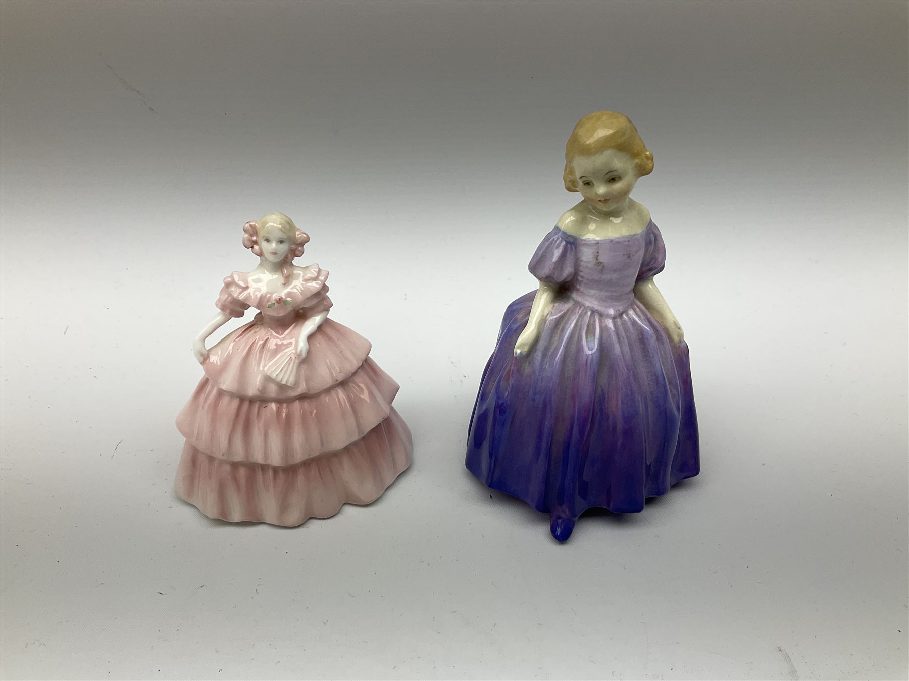 Two Royal Crown Derby pattern Imari soup bowls, pattern 2451, Belleek Fermanagh Ireland four piece set in green shamrock pattern, Royal Doulton small lady figure, Marie HN1370, large Wedgwood fruit bowl, Sylvac jardiniere in autumn leaves pattern, five pieces Co-operative Society commemorative ceramics, with selection of other ceramics. 