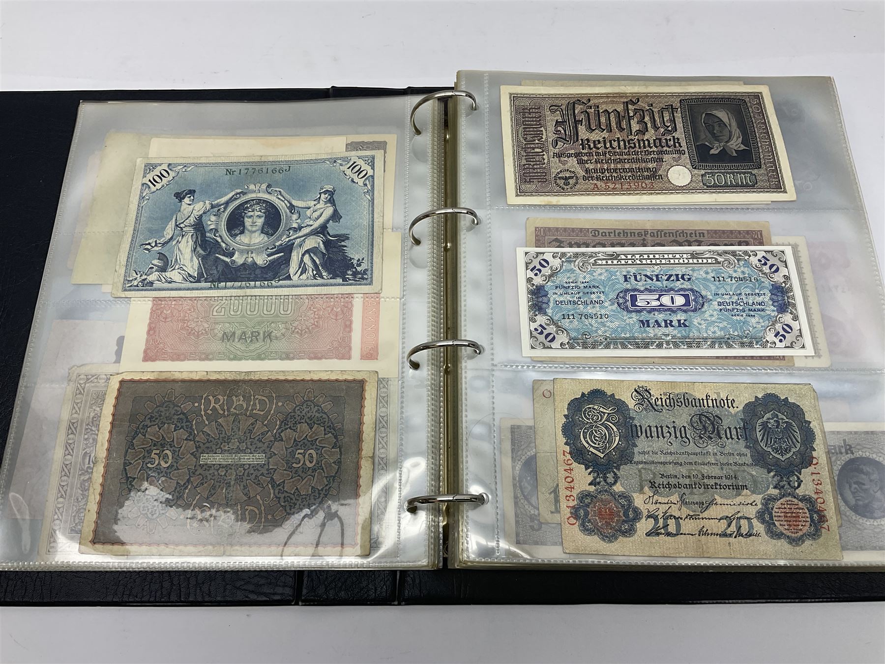 World and Great British banknotes to include Brazil, Canada, France, Germany, Ghana, Indonesia, Iraq, Hong Kong, Hungary, Japan, Vietnam, Zimbabwe, a collection of Chinese ‘Hell Money’, and quantity of ‘De La Rue Systems’ test notes, housed in ring binder and loose