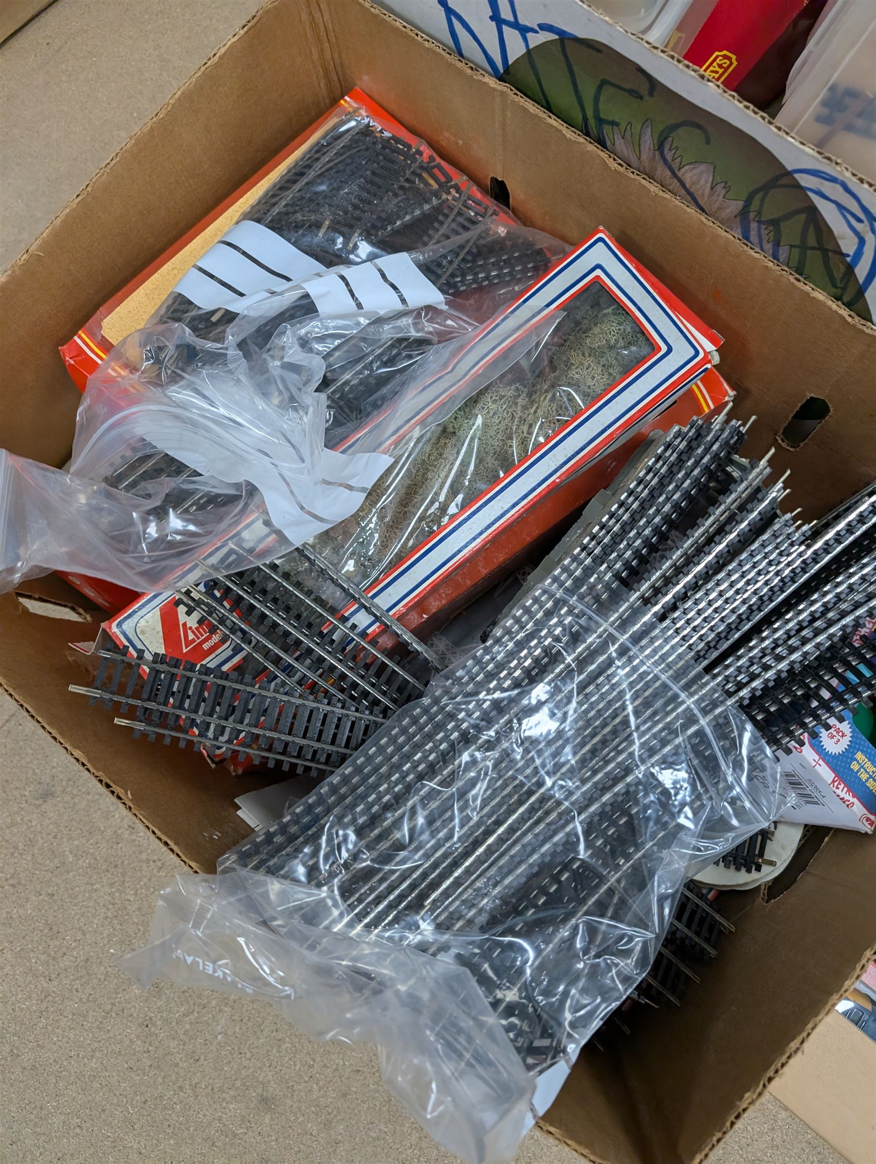 Collection of mostly Hornby '00' gauge model railway, including two Inter-City locomotives and carriages, railway buildings and scenery, track, controllers and other accessories, some boxed and some empty boxes