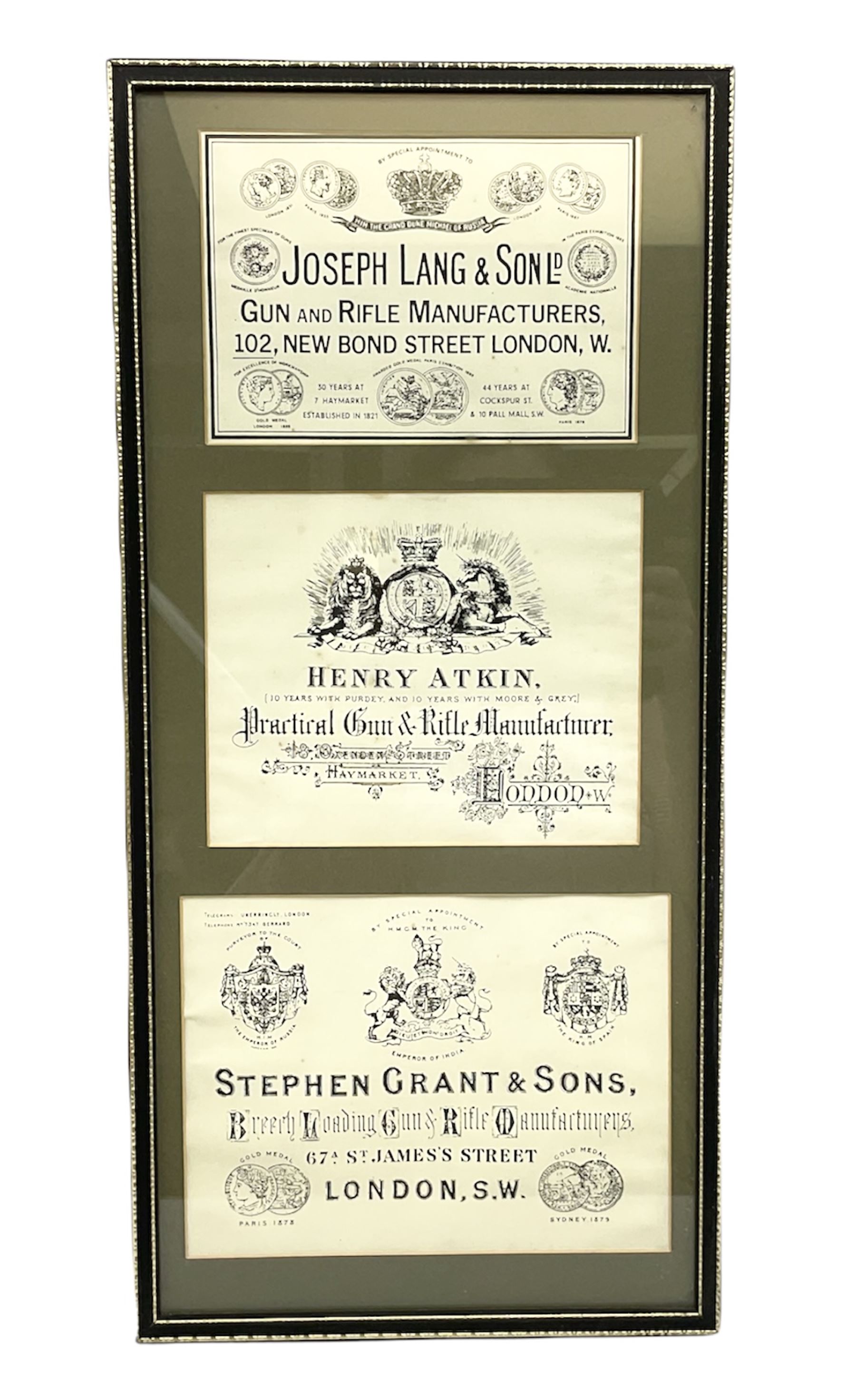 Framed display of three trade gun case labels for Joseph Lang & Son, Henry Atkin and Stephen Grant & Sons, mounted in Hogarth style frame 56 x 25cm