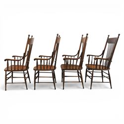 Set of eight 19th century ash and elm spindle back Windsor armchairs, arched top rails above fan-shaped spindle backs, curved arms with turned supports, shaped saddle seats, on turned legs joined by H-stretchers