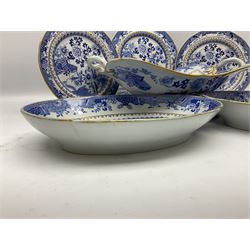 Early 19th century Spode dessert set, circa 1805-1830, blue and white transfer printed in the Grasshopper pattern, comprising comport of oblong form with twin naturalistically modelled branch handles, two oval dishes, and six plates, each with blue or green printed mark beneath, including handles comport H11.5cm W34cm, oval dishes W26.5cm, plates D20.5cm