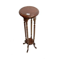 Mahogany jardinière stand, circular moulded top on barley twist turned supports