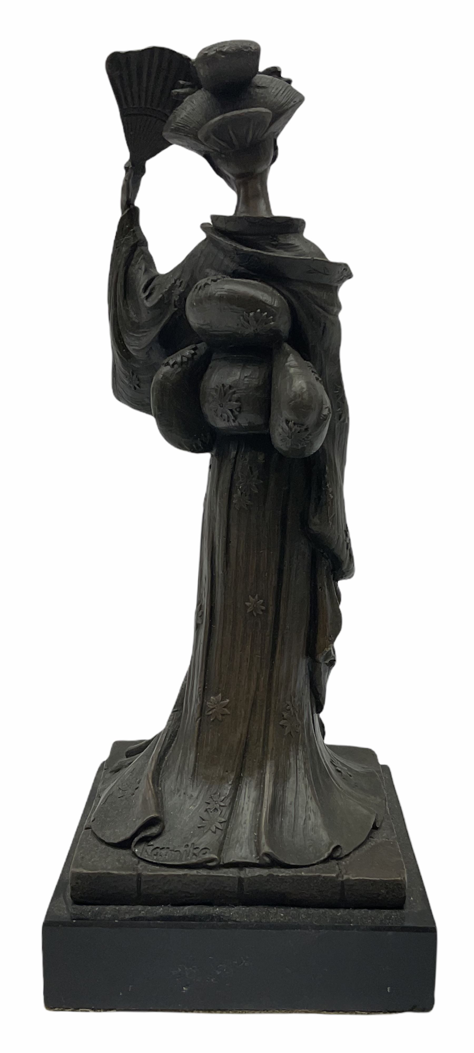 A Japanese bronze modelled of a Geisha, impressed Kamiko, upon slate base, H25cm. 