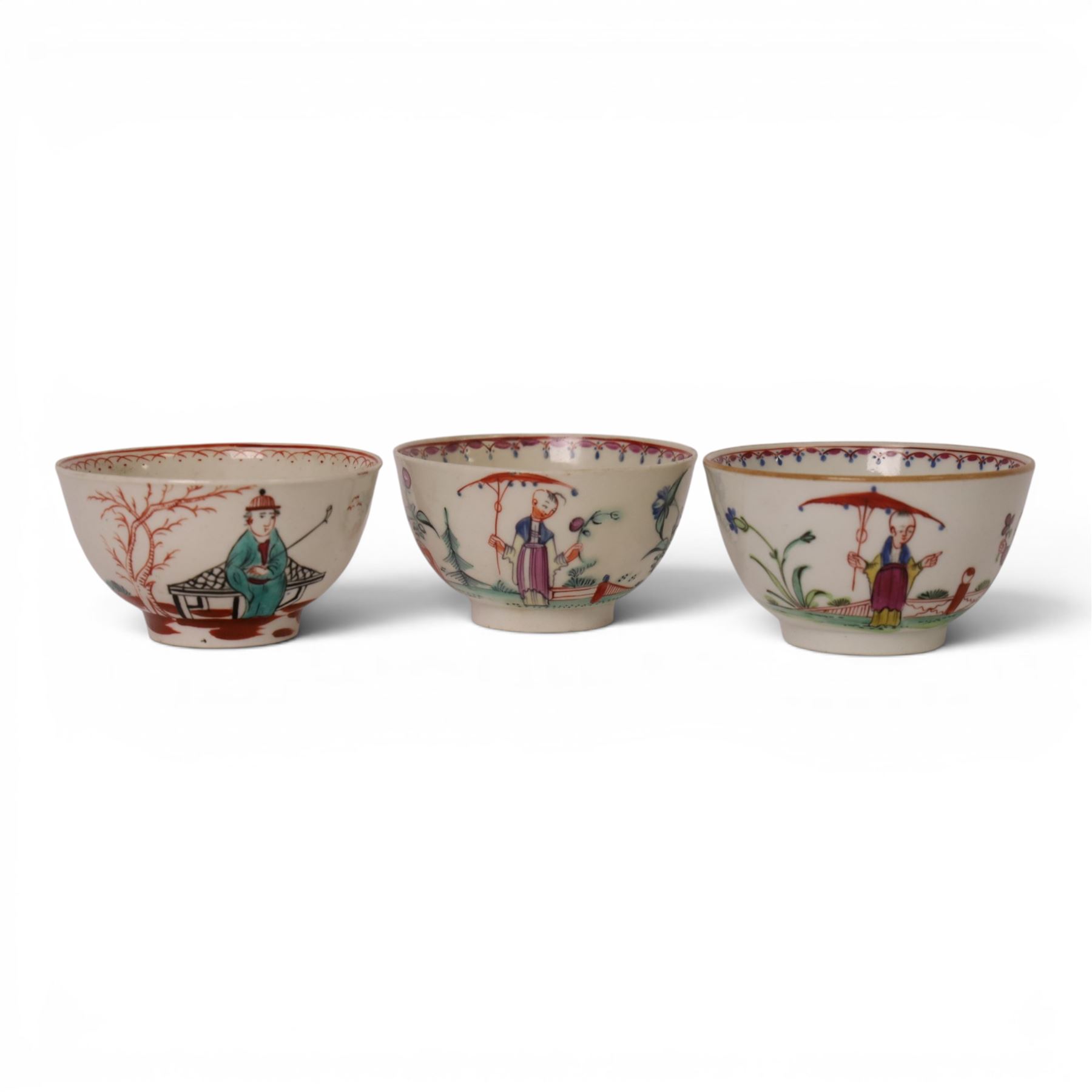 18th/ 19th century chinoiserie decorated porcelain including two New Hall tea bowls and a coffee cup in Boy and the Windmill pattern, Worcester Mandarin coffee cup and Liverpool tea bowl 