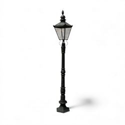 Victorian-style cast iron lamp post in a black finish,