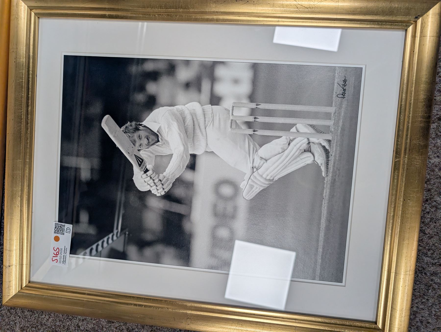 Collection of cricket memorabilia, including three black and white prints of Sir Ian Botham, colour print of Sir Ian Botham, signed limited edition Ashes Winners print, and a framed piece of The Times 1895, all framed, largest H70cm