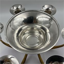 Modernist silver plated candelabra centrepiece by Stuart Devlin, with six pierced gilt branches supporting a central tapering cylindrical rose bowl and six fluted candle holders, with detachable star shaped gilt cover, stamped SD, TG to underside of central bowl, overall H17cm