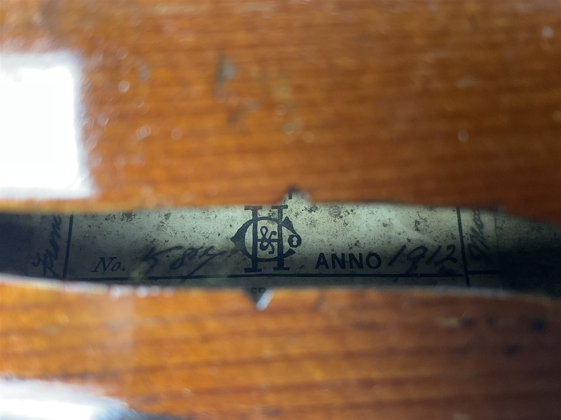 Early 20th century French Mirecourt violin with 35.5cm two-piece maple back and ribs and spruce top; bears label 'The Garrodus Violin H & Co No.1587 Anno 1912' L59cm overall; in modern fitted case with bow