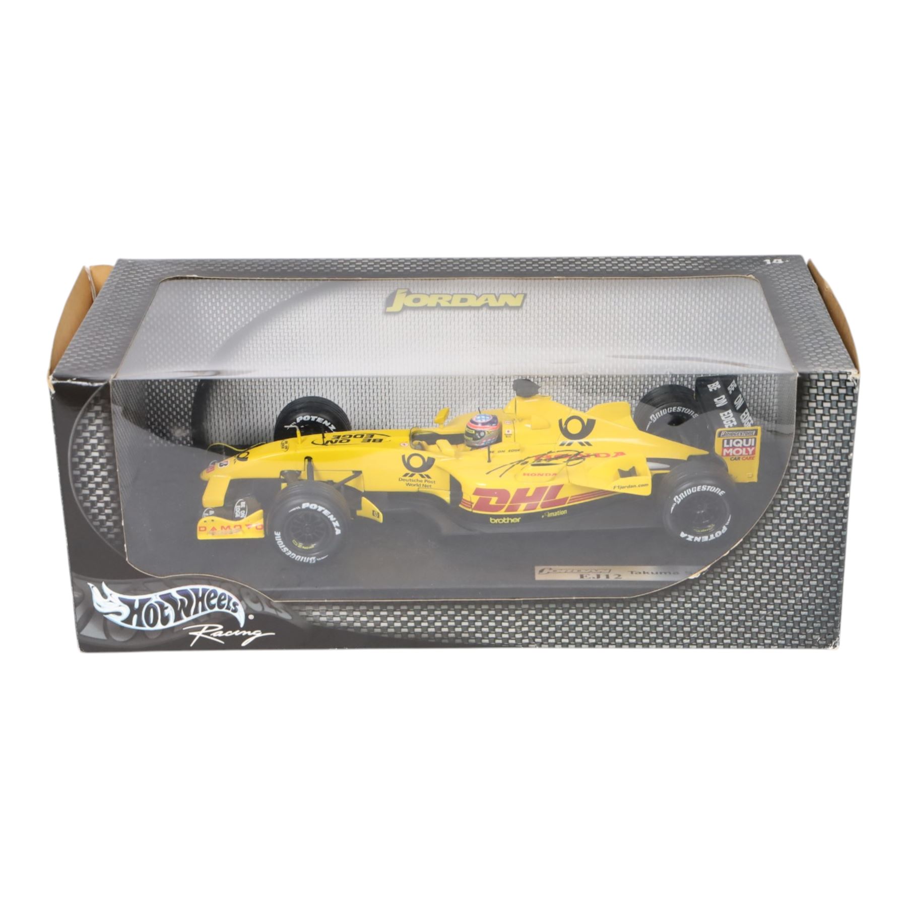 Three signed limited edition 1:18 scale Formula One models, comprising Hot Wheels Jordan EJ12 signed by Takuma Sato, Hot Wheels Jaguar Racing R2 signed by Eddie Irvine and a Minichamps Williams F1 Team model signed by Jenson Button, 1:18 scale model, all boxed