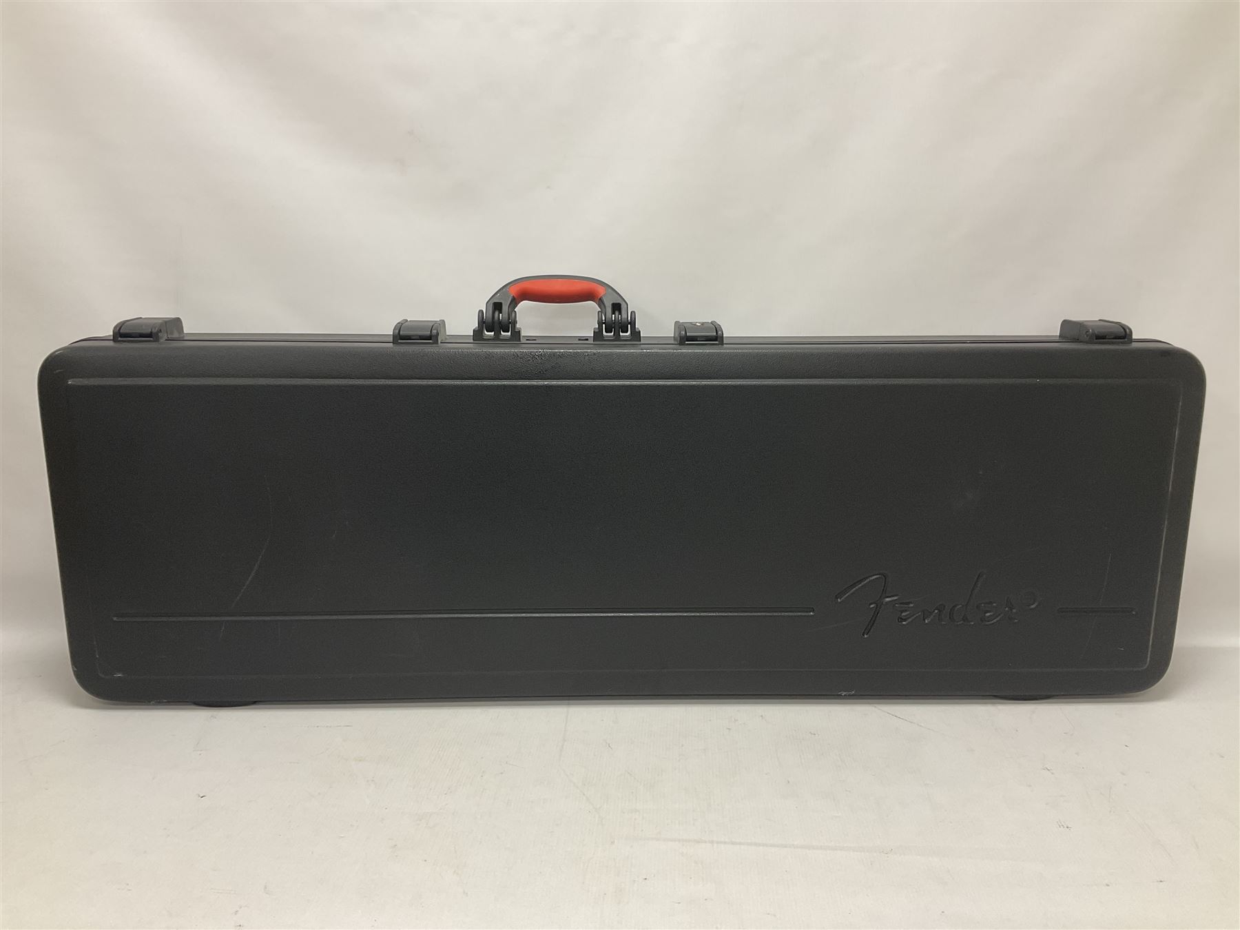 Fender Precision Bass guitar, in Olympic White finish with tortoiseshell effect scratchboard, serial no US15103092, in black Fender hard case with Fender strap and warranty card, guitar L116cm