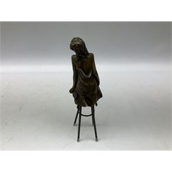 Art Deco style bronze modelled as a semi-nude lady seated on a stool, signed 'Pierre Collinet', H26cm