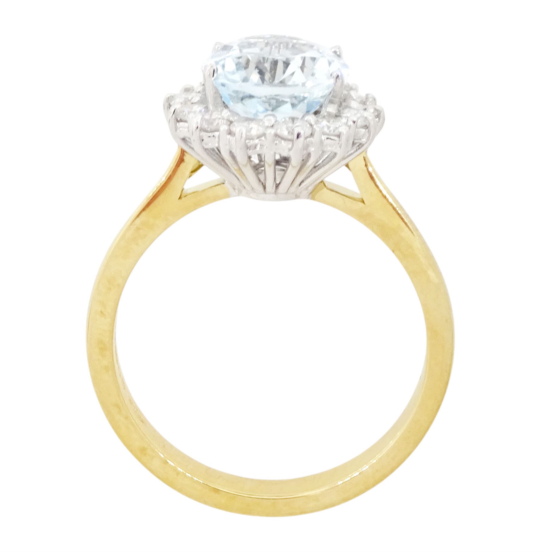 18ct white gold aquamarine and diamond cluster ring, single oval cut aquamarine of approx 2.30 carat, surrounded by fourteen round brilliant cut diamonds, London 2022, total diamond weight approx 0.45 carat