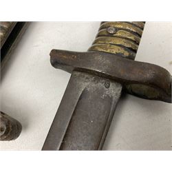 Five 19th century bayonets in relic condition without scabbards comprising British Pattern 1876 socket bayonet with Indian markings; French Model 1874 epee bayonet; and three French Model 1866 sabre bayonets (5)