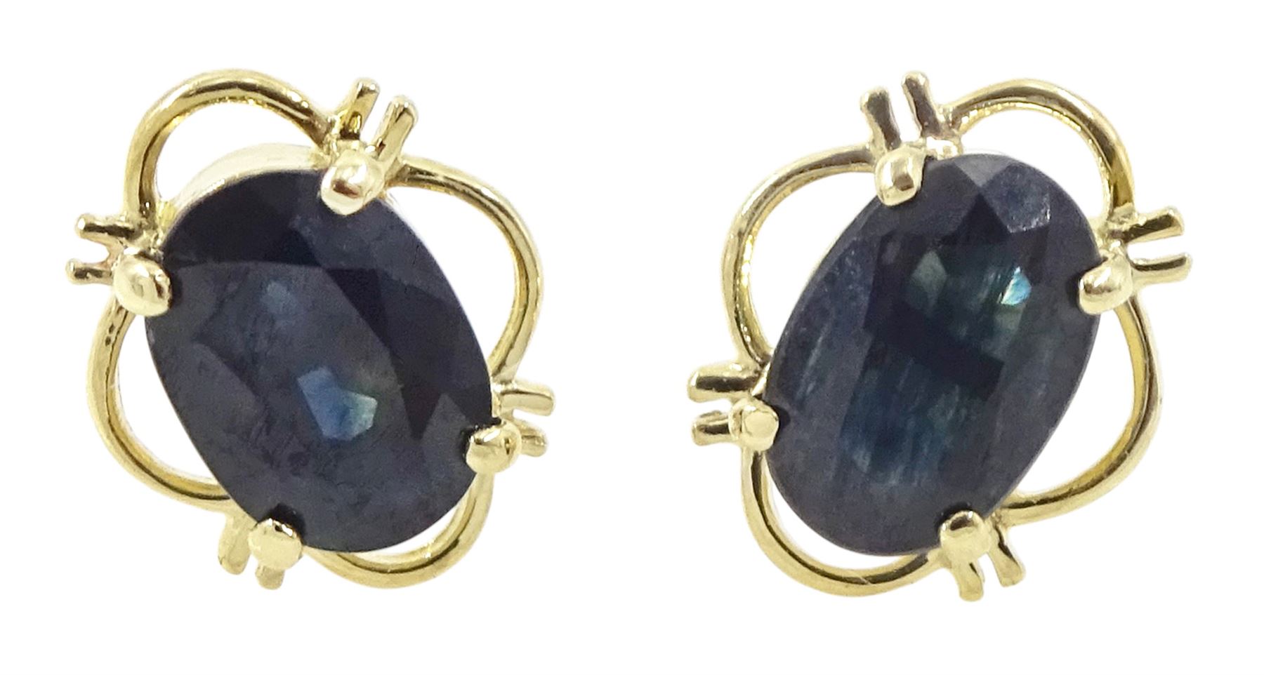 Pair of 9ct gold oval cut sapphire stud earrings