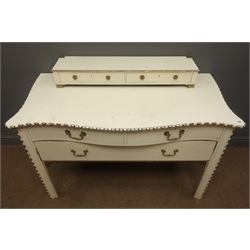  French style dressing table, two small trinket drawers above serpentine front, two drawers, cream and gold finish, W122cm, H90cm, D60cm  