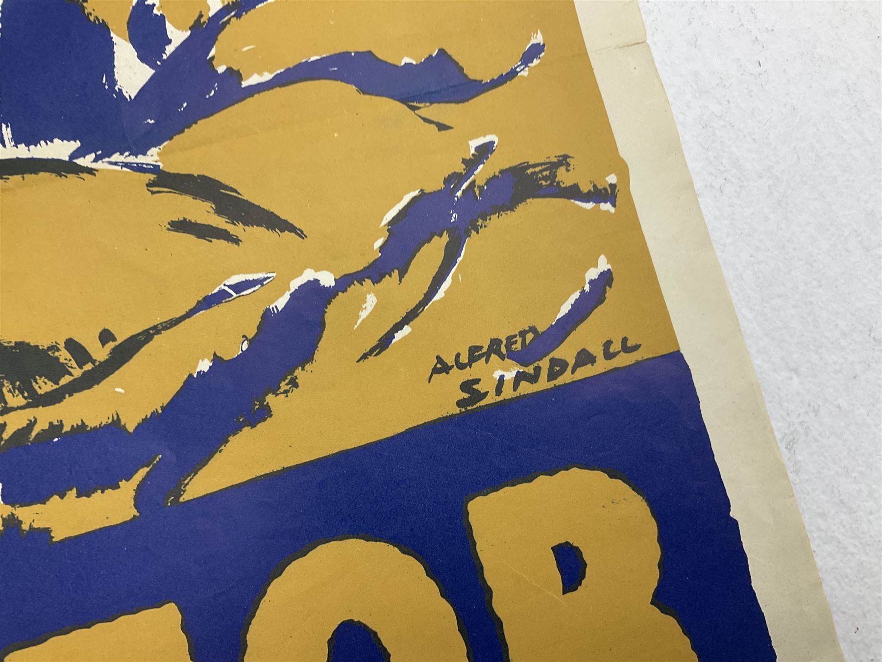 WW2 poster after Alfred Sindall printed for H.M. Stationery Office by Wm. Brown & Co Ltd London E.C.3; poster No.S.P.37 'Paper For Salvage Helps To Feed The Guns' depicting British Soldiers firing a field gun 75 x 51cm; blue, gold and white; unframed