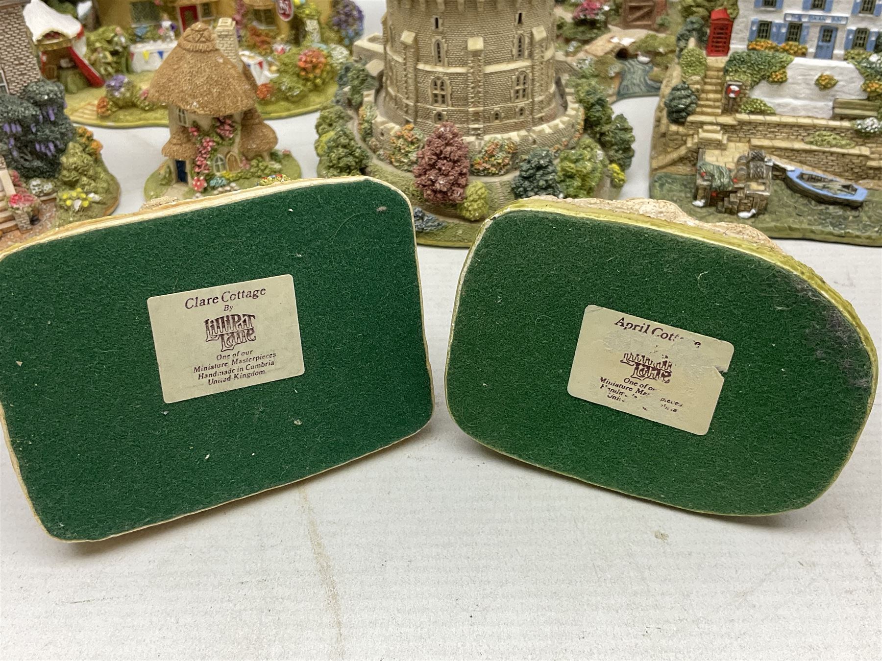 Sixteen Lilliput Lanes, to include The Golden Jubilee, Round Tower - Windsor Castle, Castle of the Golden Chalice, Travellers Rest, with box and deed,  Summer Days, Sunshine Creek, Writing with Lewis Carol, with box and deed,  etc 