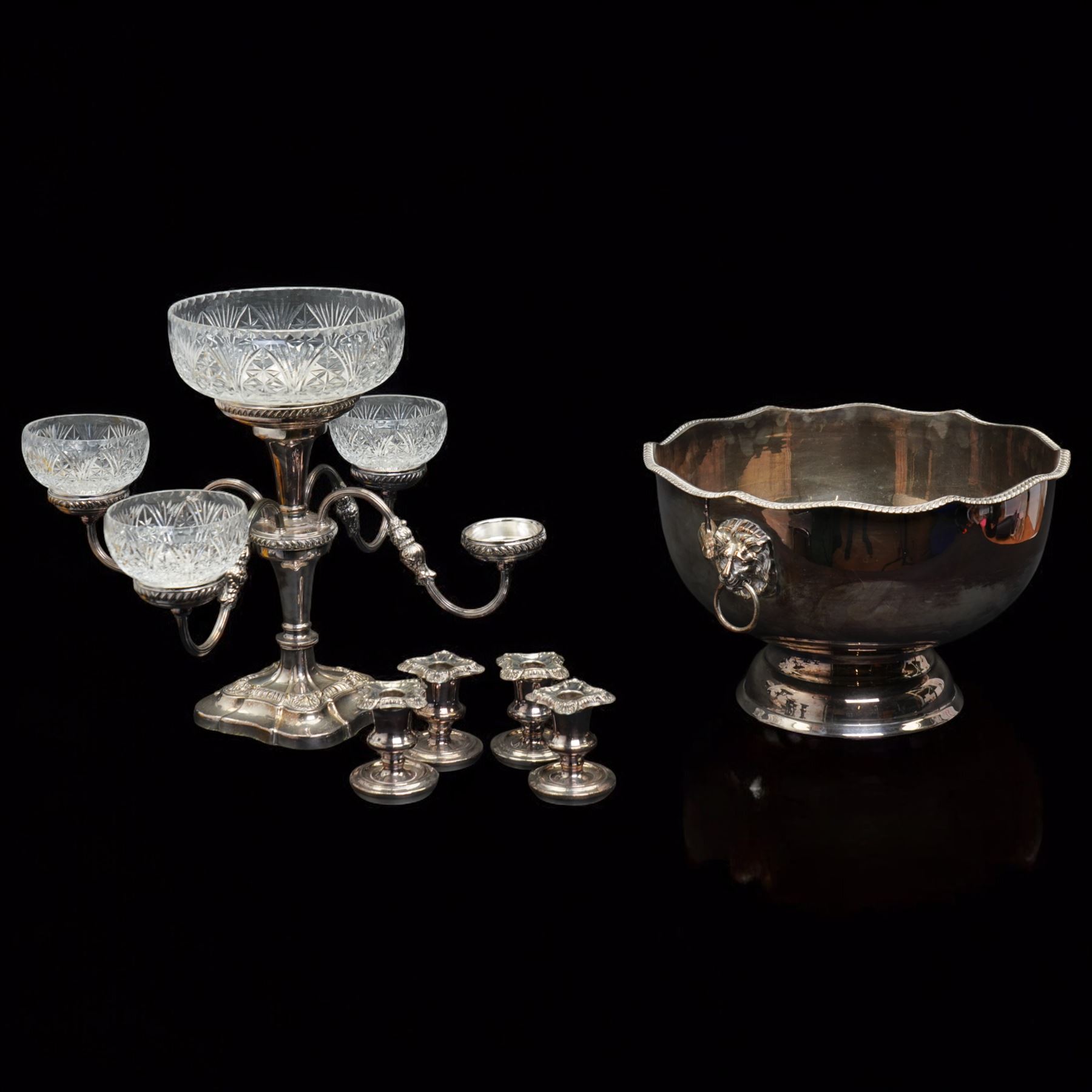 Silver plated four branch centrepiece set with glass bowls and a larger centre bowl and with interchangeable candle sconces H37cm  and a plated punch bowl with lion mask handles D37cm (2)