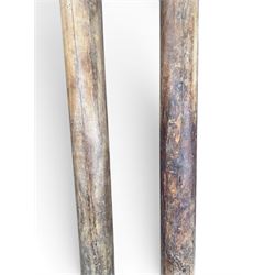 Matched pair of 19th century hardwood architectural columns with carved capitols, column diameter 18cm