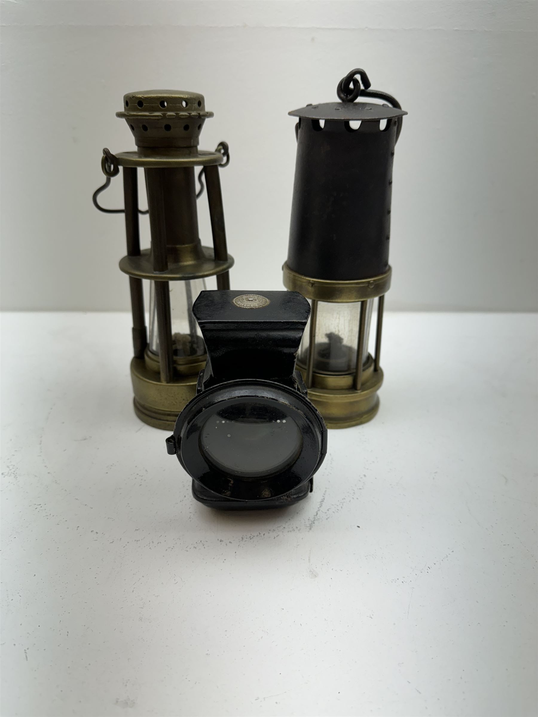 Two miners lamps, together with animal traps, bull whip etc 