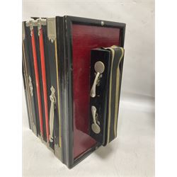 Three European concertinas, comprising Viceroy German concertina with 21 keys, hexagon wooden frame and 8 fold bellows
Oak framed concertina with 12 keys and 8 fold bellows
Commander concertina with 12 keys and 12 fold bellows
With tutor