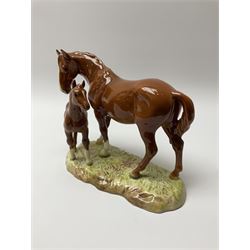 A Beswick model of a chestnut mare and foal on naturalistic base, 2nd version model no 953, with printed mark beneath, H19.5cm. 