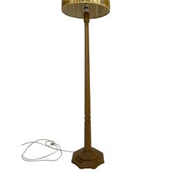 Mouseman - oak standard lamp, octagonal tapered column on octagonal base carved with mouse signature, by the workshop of Robert Thompson, Kilburn