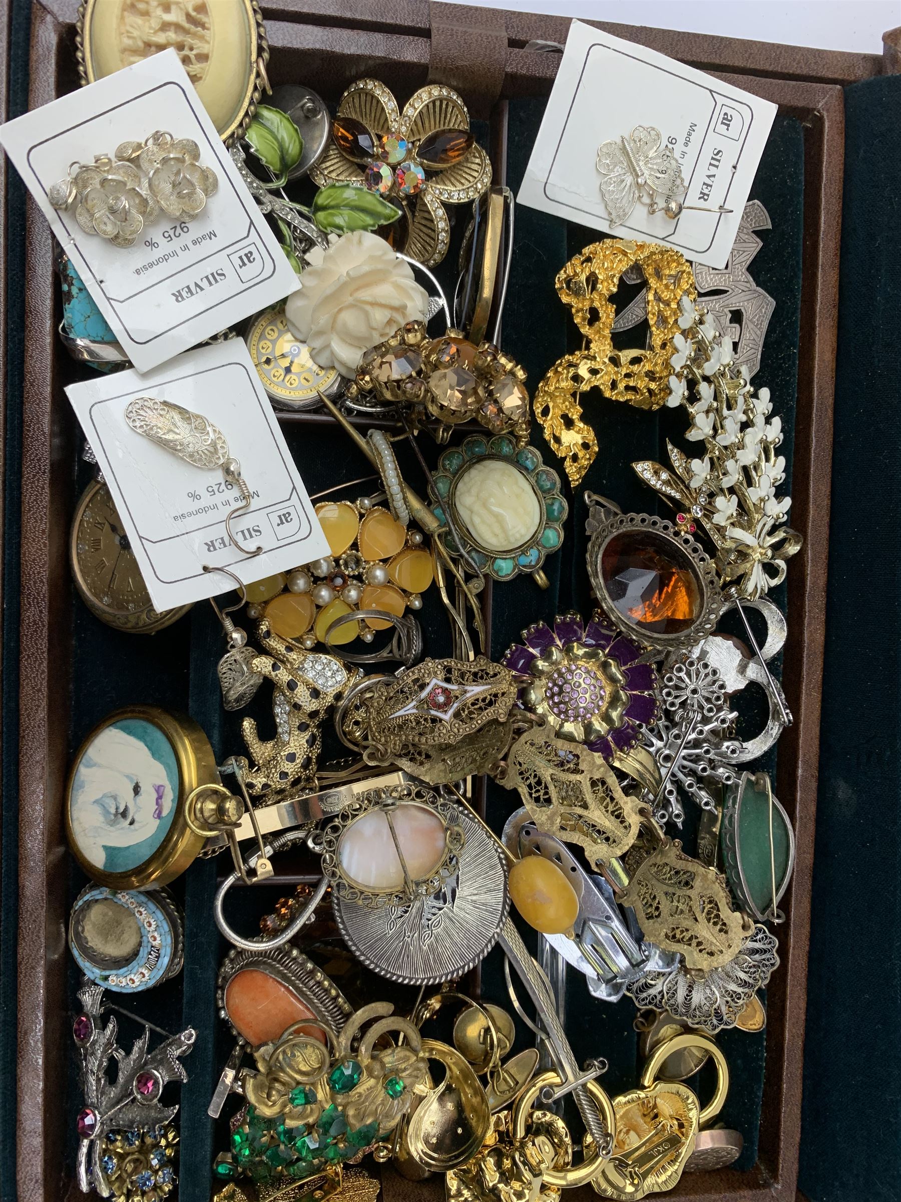 Vintage and later costume jewellery comprising a Brid's claw brooch with silver-plated mounts, micro mosaic circular brooch, Cameo brooch, a ladies gilt brass pocket watch, early 20th century Chinese carved ivory brooch and other items of jewellery contained in a modern jewellery box 