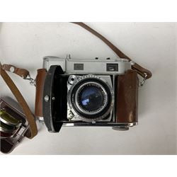 Kodak Retina III camera with 'Schneider-Kreuznach 3977724 Retina-Xenon C f:2/50mm' lens in leather case, and Brownie Model D in leather case