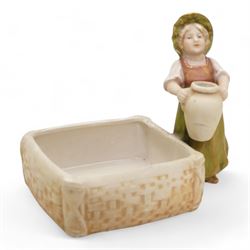 Royal Dux figural basket, modelled with a boy sitting upon the rim, H20cm, a Royal Dux figural trinket dish and a figural jug (3)