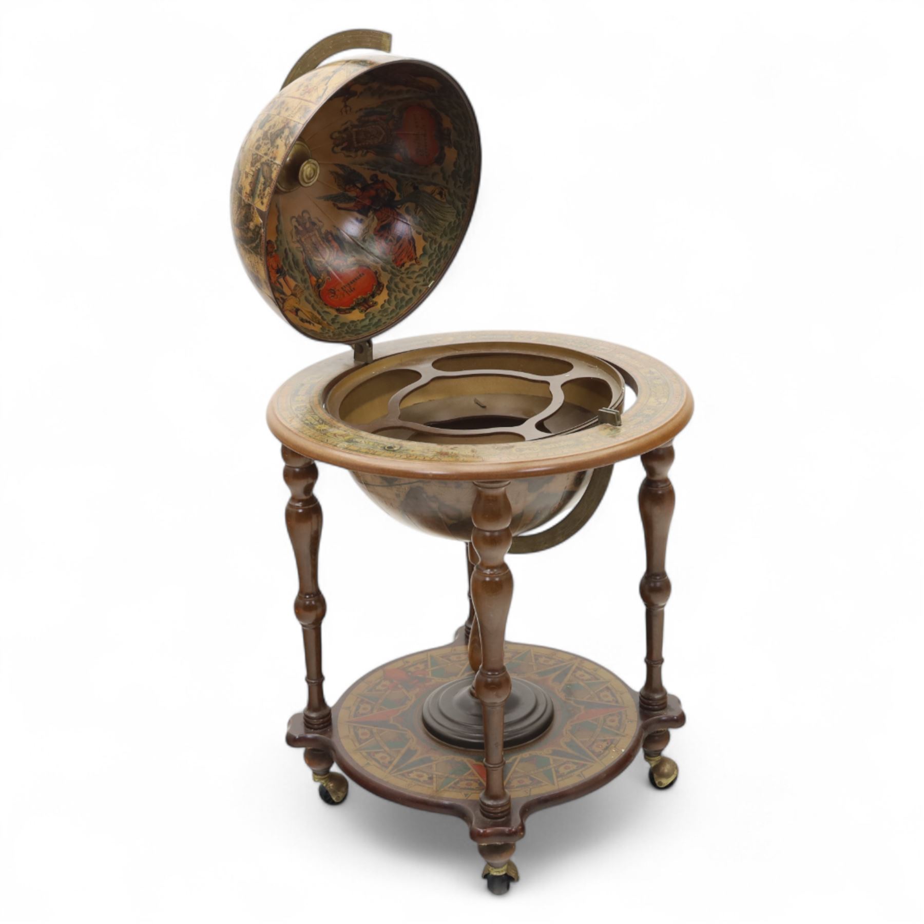 20th century Italian design drinks globe, the hinged celestial printed sphere enclosing a fitted bottle and glass compartment, circular base decorated with zodiac signs and mounted on turned supports with castors
