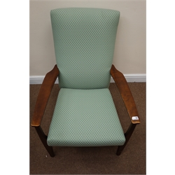  Pair Parker Knoll teak framed armchairs, upholstered in a green patterned fabric, W66cm  