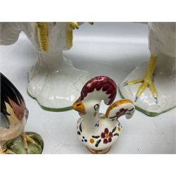 Pair of fighting cockerels from Italy together with three other ceramic cockerels, largest H30cm 