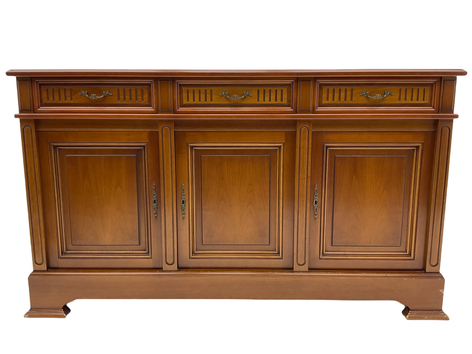 Contemporary cherry wood sideboard, rectangular moulded top over three drawers and three cupboards