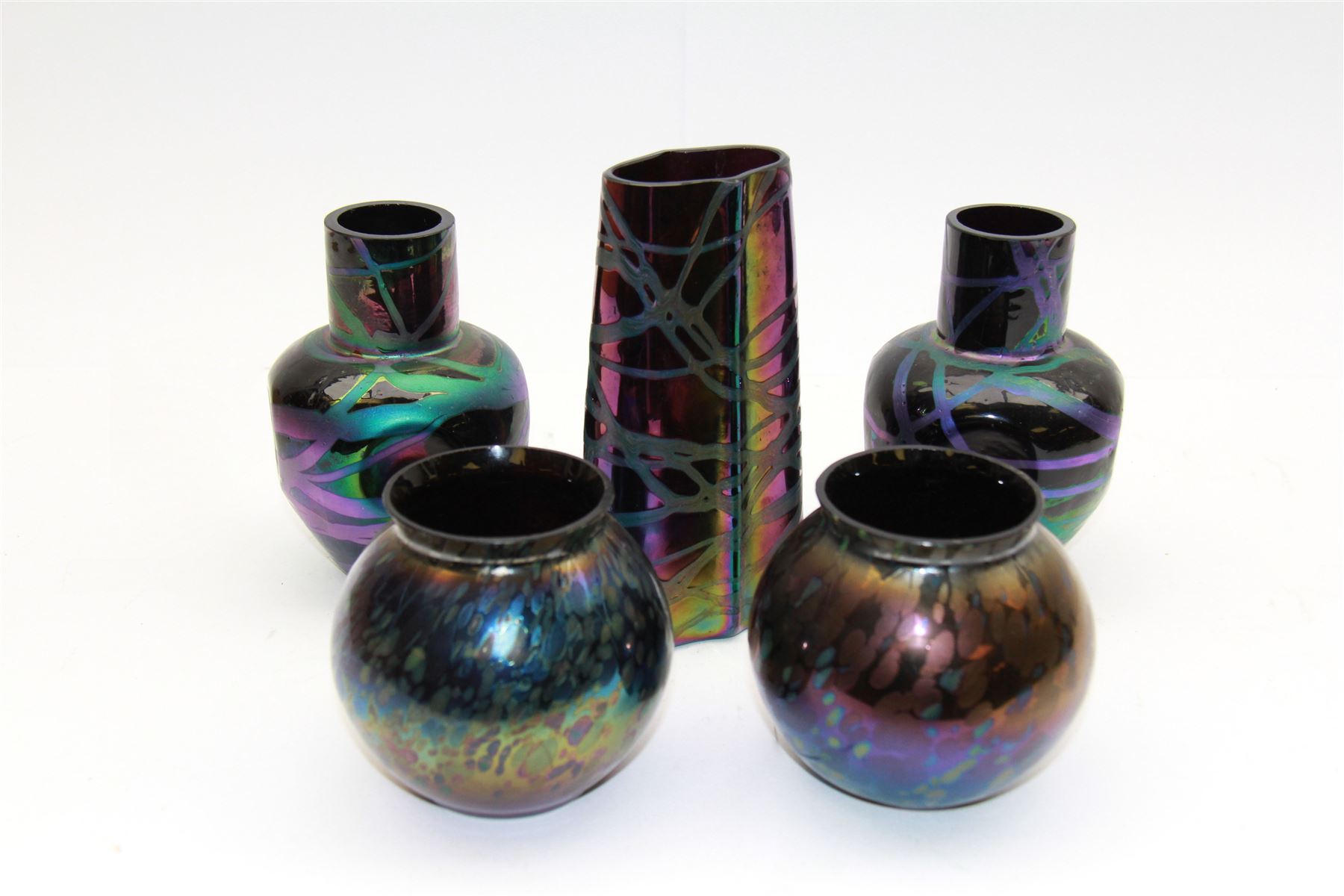 Five Austrian Art Nouveau purple glass vases, to include a Pallme-Konig example, of tapering form with matte vein decoration, and two similar pairs, tallest H16cm