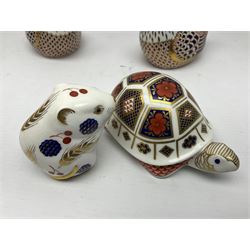 Seven Royal Crown Derby Paperweights, to include Field mouse with silver stopper, Dormouse, Chicken etc,  six without stoppers   