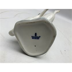 Seven Lladro figures, comprising Playful Puppy no 9135, Platero and Marcelino/Boy Hugging Donkey no 1181, Mini Seal Family no 5318, Attentive Polar Bear no 1207, Seated Polar Bear no1209, Eskimo Boy with Pet no 5238 and Girl with Geese no 1035, together with Nao goose