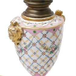 Pair of Sevres style table lamps, with pink and gilt floral decoration, apocryphal marks to bases, H32cm (2)