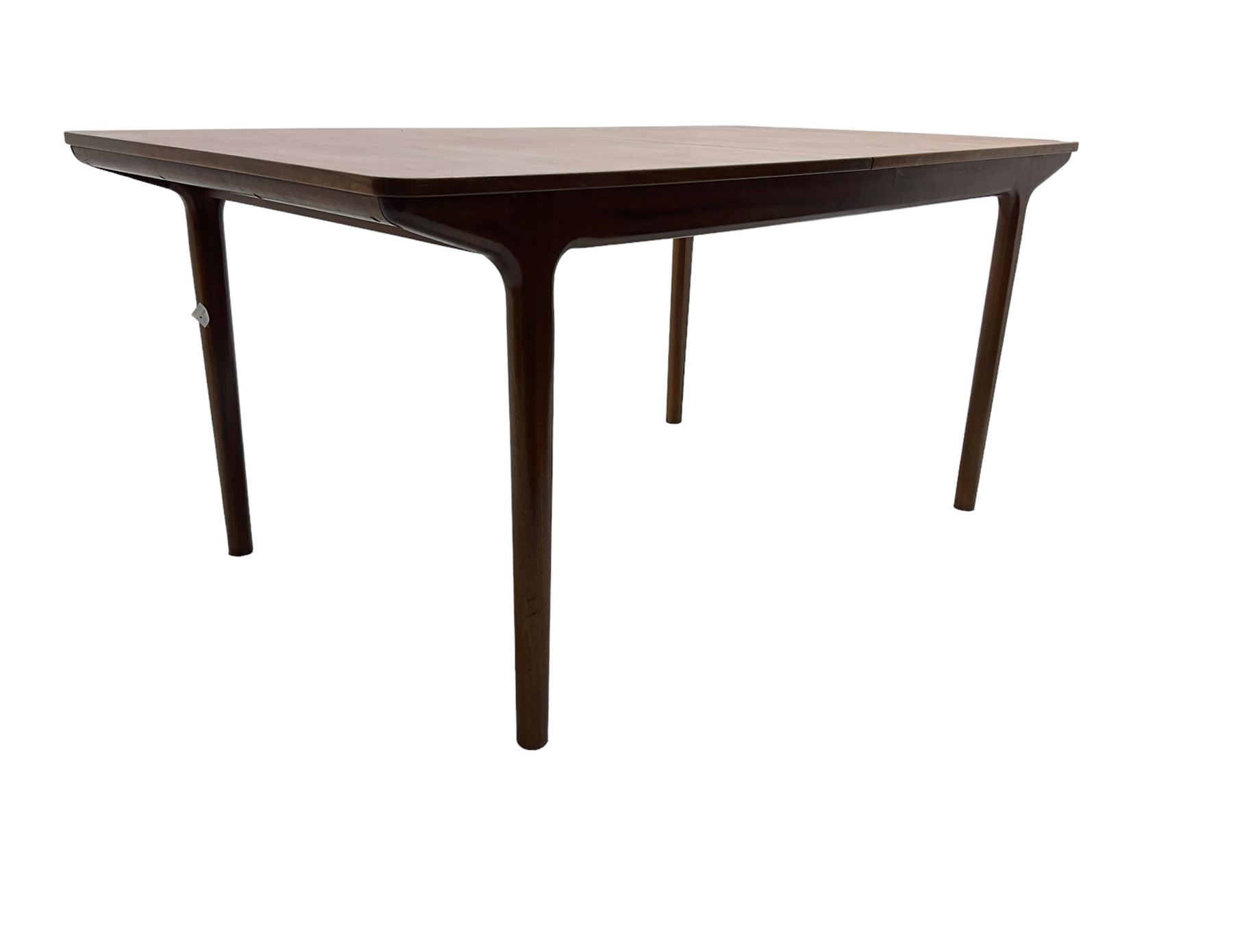 Tom Robertson for AH McIntosh & Co of Kirkaldy - mid-20th century teak extending dining table, rectangular top with rounded corners, concealed integrated double leaf, raised on tapered supports, metal label to underside of leaf