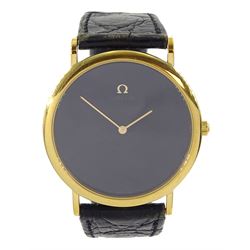 Omega De Ville gentleman's gold-plated and stainless steel quartz wristwatch, Cal. 1378, black dial, on Omega black leather strap with Omega gilt buckle