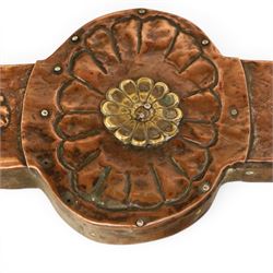 Arts and Crafts copper mounted coffee table, rectangular top with embossed foliate border and stylised corner motifs, studwork detail, on cylindrical supports united by pierced shaped stretcher with applied flowerhead bosses
