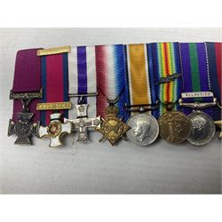 Captain (later Brigadier) Percy Howard Hansen V.C., D.S.O., M.C. 6th (Service) Battalion Lincolnshire Regiment - representative group of thirteen miniature dress medals comprising VC, DSO, MC, WW1 trio, GSM with Palestine clasp, four WW2 medals/stars, George VI Coronation Medal and French Croix-De-Guerre with MID leaves; all with ribbons on pinned bar for wearing; together with display of contemporary tunic ribbon bars for eight medals, framed with Lincolnshire Regiment cap badge, newspaper cutting and London Gazette extract; framed head and shoulder portrait of Hansen in uniform clearly showing his medal bars; and copies of related biographical information. Auctioneer's Note: Extract from the London Gazette 1st October 1915 regarding the VC 'For most conspicuous bravery on the 9th August 1915, at YILGHIN BURNU Gallipoli Peninsular. After the second capture of the 