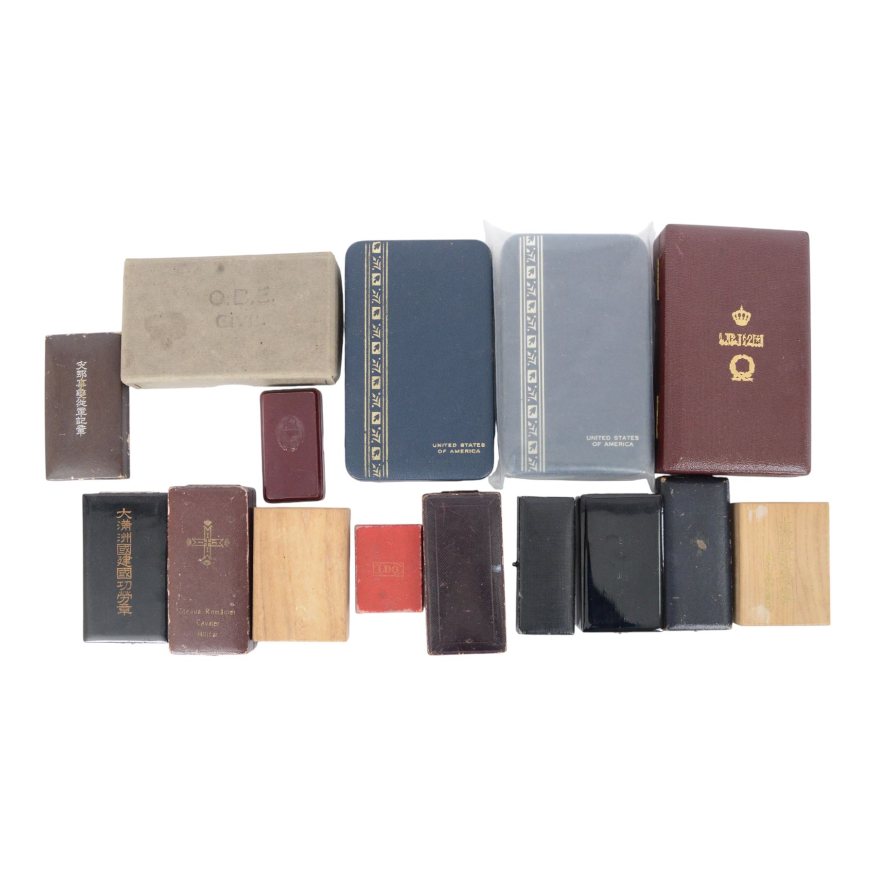 Collection of fifteen worldwide award/medal empty boxes and cases, including examples from USA, Germany, Japan, Greece, Belgium, N.Korean etc
