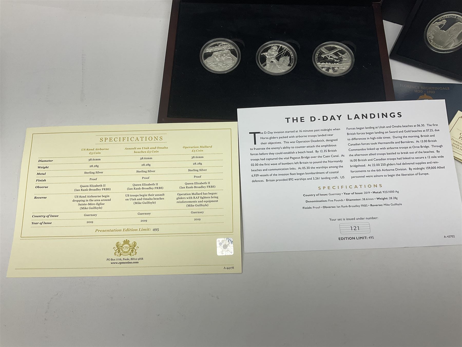 Queen Elizabeth II Channel Islands and Isle of Man silver proof five pound coins, comprising Bailiwick of Jersey 2016 'Lest we Forget', 2019 'D-Day 75th Anniversary' three coin set', Bailiwick of Guernsey 2020 'Florence Nightingale 200th Anniversary' and Isle of Man 2021 'William and Kate Wedding Anniversary', all cased with certificates