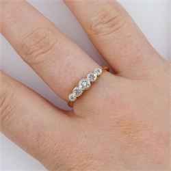 Early 20th century gold illusion set five stone diamond ring, stamped 18ct Plat