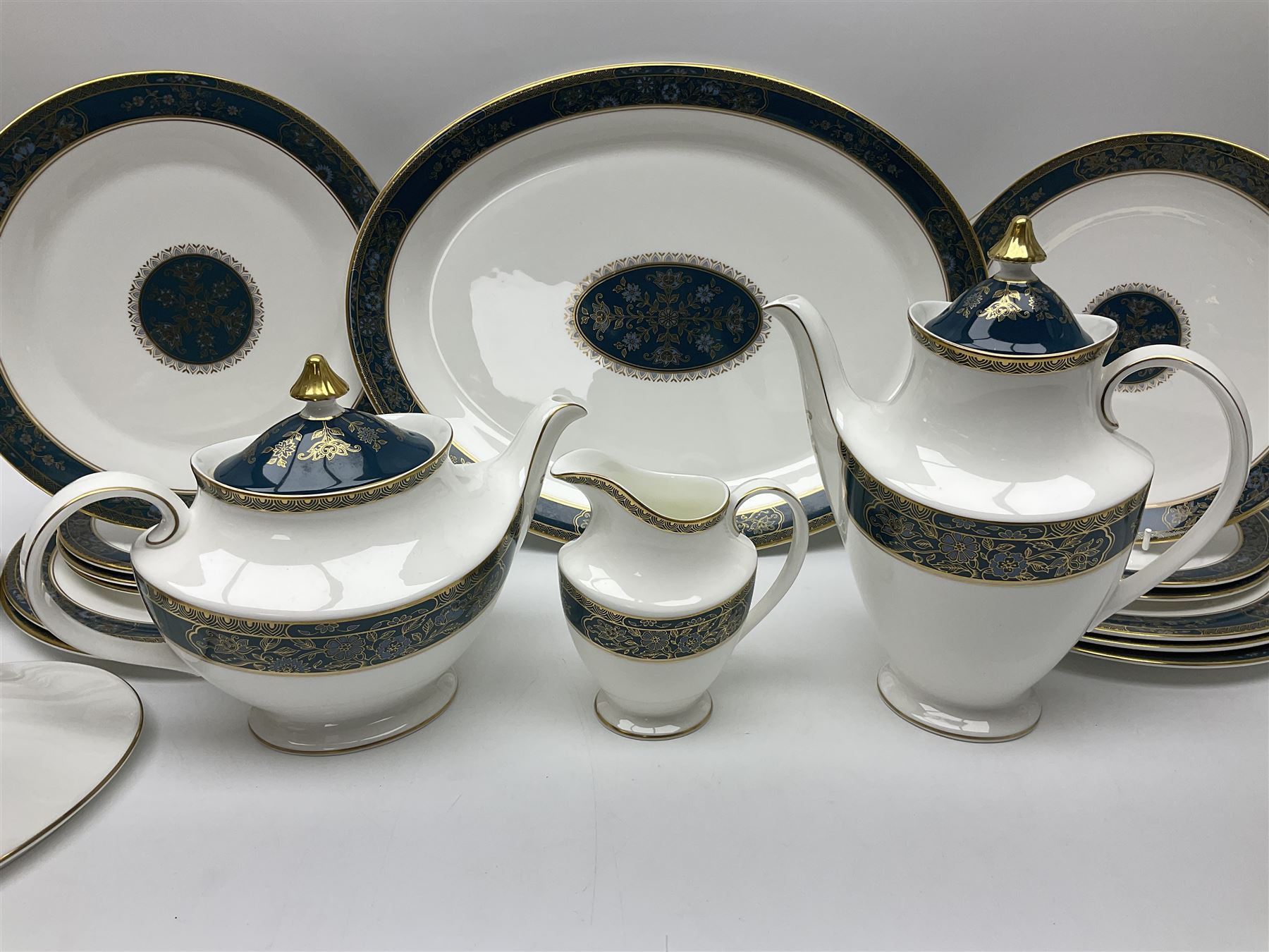 Royal Doulton Carlyle pattern tea and dinner service for six, to include teapot, coffee pot, teacups and saucers, coffee cups and saucers, milk jug, open sucrier, dinner plates, side plates, bowls, soup bowls, to covered dishes etc (64) 
