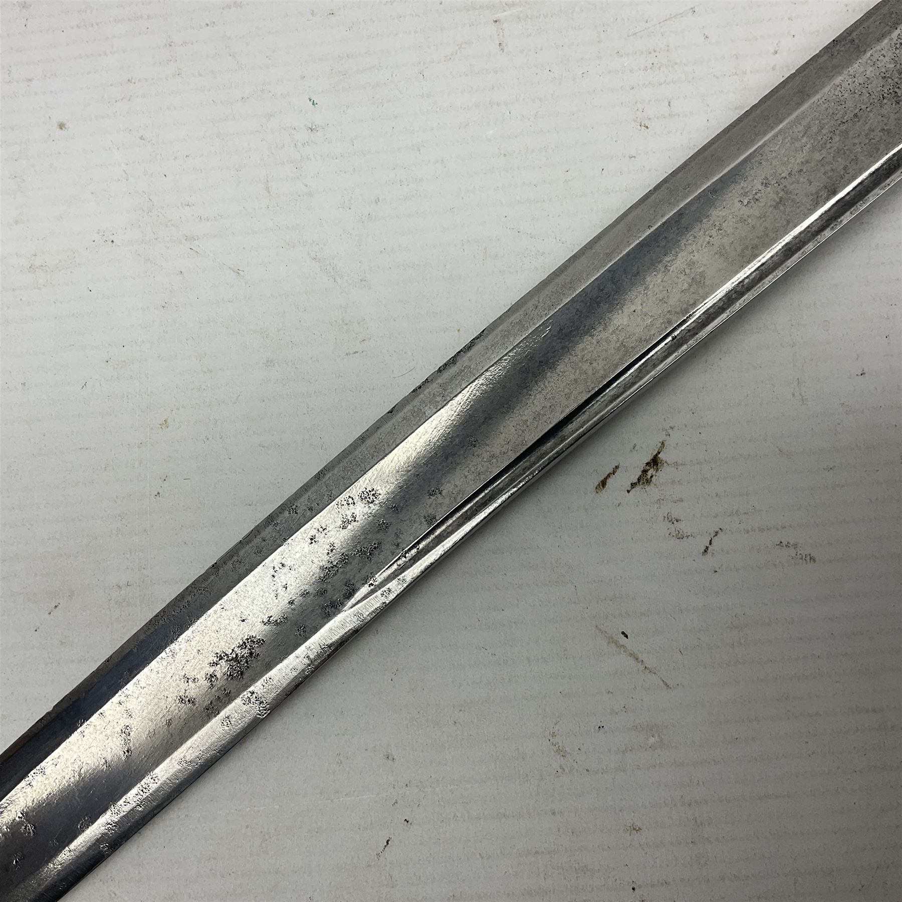 Late 18th century French 1st Empire Troupe a Pied Petit Montmorency Branch Tournante officer's sword, with 72.5cm slightly curving fullered blade, pierced brass hilt with lockable swivelling bar, fully wire-bound grip with lion head pommel, L88cm overall (no scabbard)