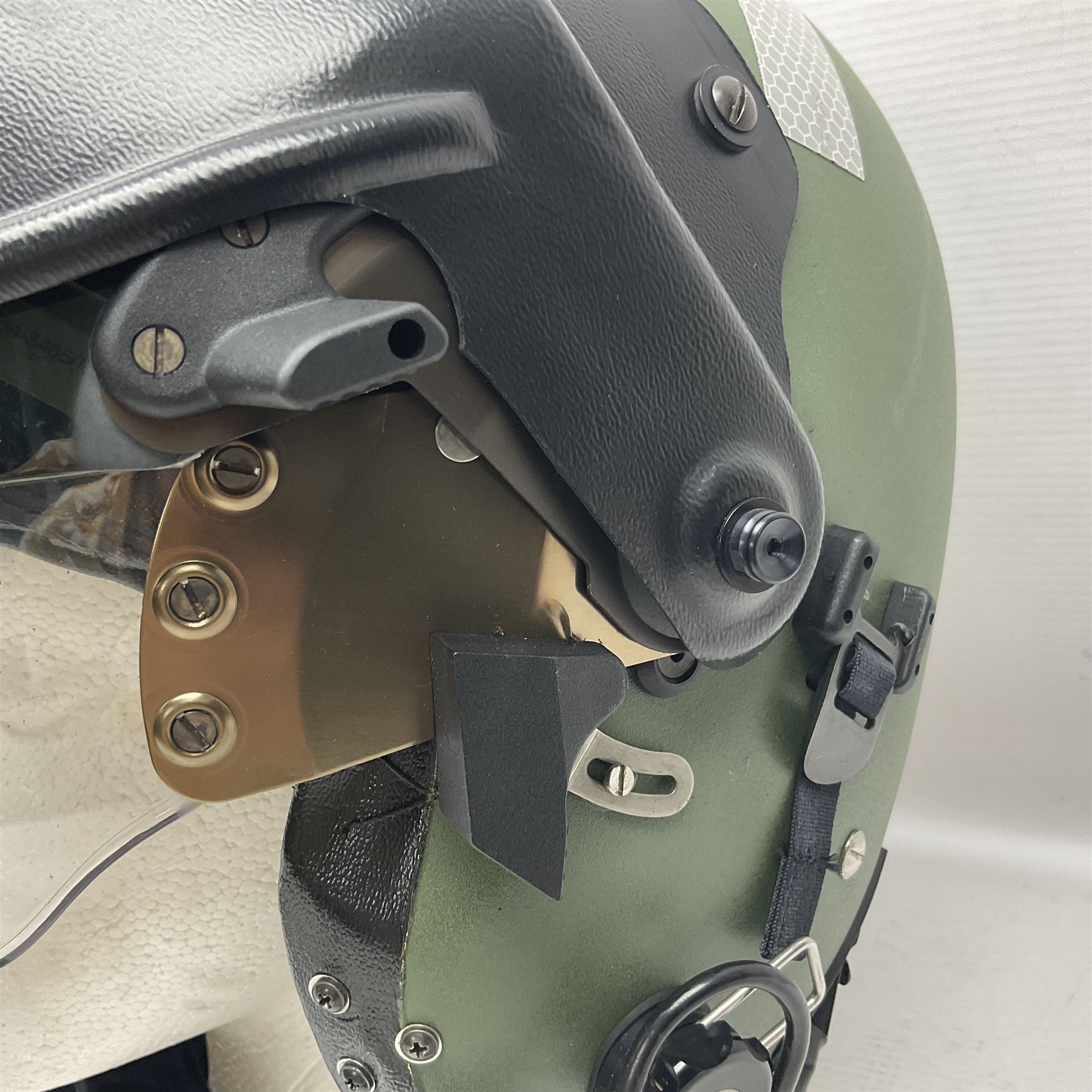 Mk.4 Flight Helmet, as used by RAF and Civilian helicopter pilots; in RAF green,  fitted with rigid visor cover and working boom mike; has had a complete refit and is bench tested.