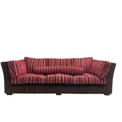 Collins & Hayes - grande three seat sofa upholstered in chocolate fabric, the loose cushions upholstered in textured fuschia stripes with contrasting spotted bolster cushions